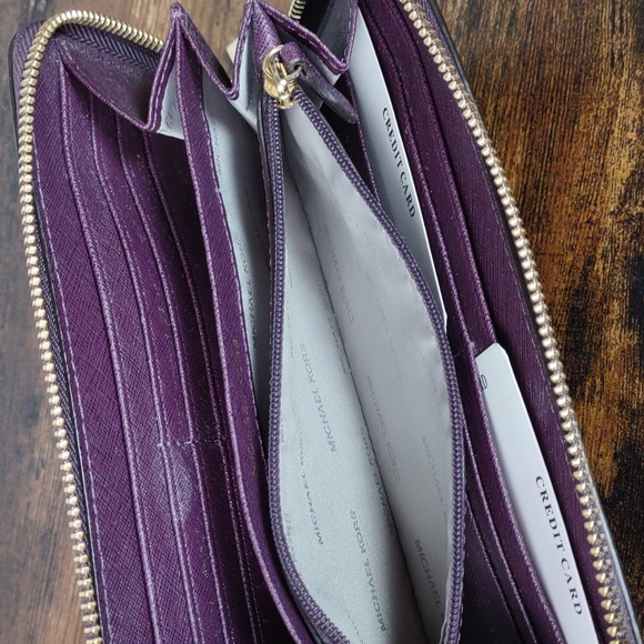 Michael Kors Plum Leather Mercer Zip Around Wallet - Picture 11 of 12